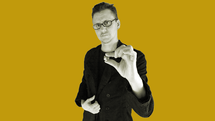 Jon Peterson holds up a many-sided die used in Dungeons & Dragons.